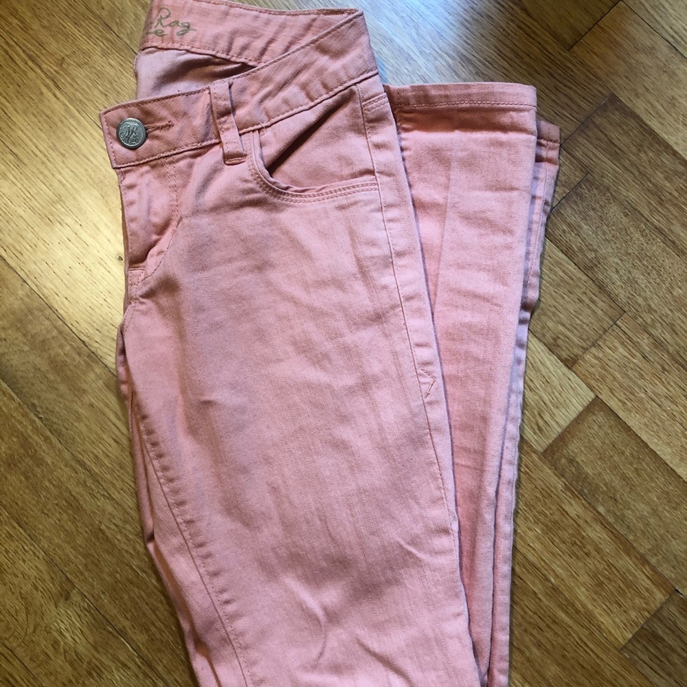 Salmon colored jeans